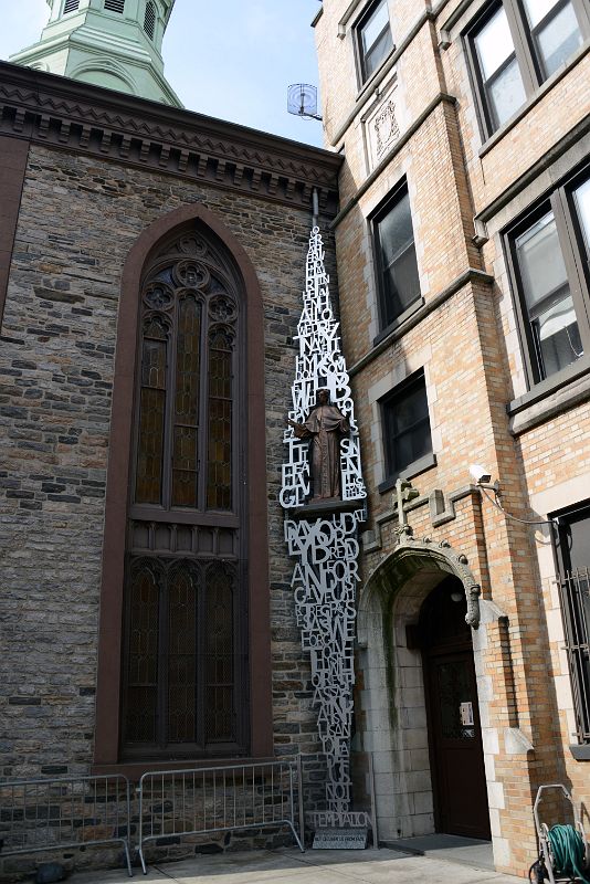 10-2 The Mandorla of Felix Varela Sculpture Is An Almond-shaped Piece Made of Aluminum Featuring The Lords Prayer At Church of the Transfiguration At 25 Mott St In Chinatown New York City